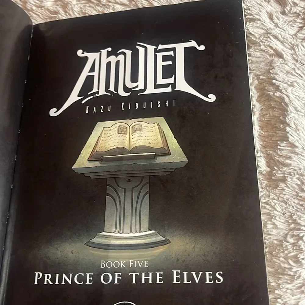 Scholastic Amulet Graphic Novel with Blue Cover